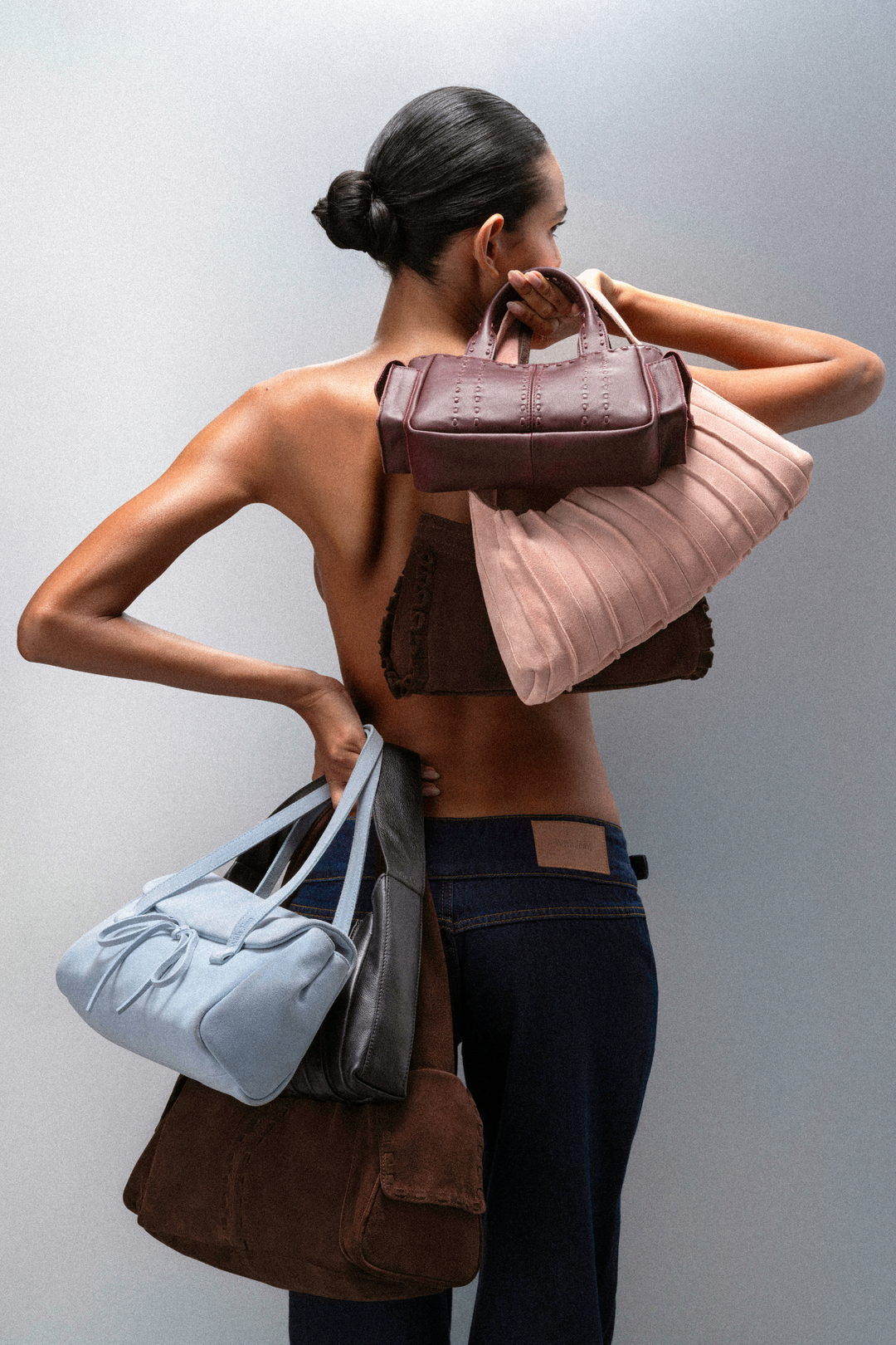 INTRODUCING HANDBAGS: A FIRST FOR WITH JÉAN